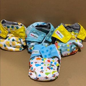 Cloth pocket diapers with sewn in insert. (4)